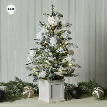 Snowy Lighted Pine Tree in Planter WhiteImage