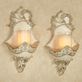 Floressa Ivory and Platinum Traditional Hurricane Wall Sconce Pair Thumbnail Image