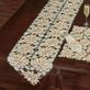 Winter Poinsettia Ivory Cutwork Table Runner and Table Linens Thumbnail Image