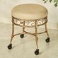 Madden Golden Bronze Metal Cushioned Vanity Stool with Caster Wheels Thumbnail Image