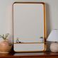 Brette Antique Gold Metal Rectangular Wall Mirror with Shelf Thumbnail Image