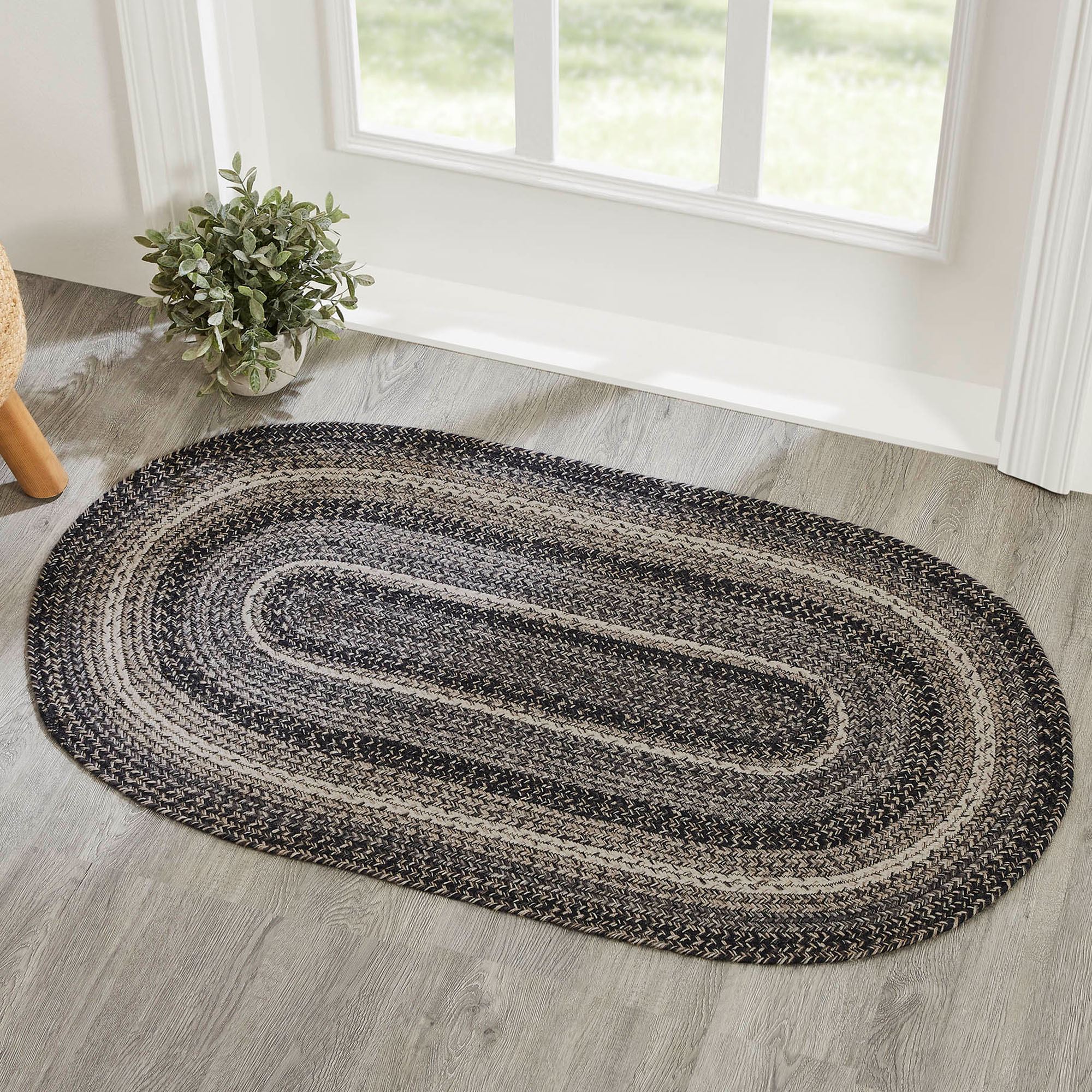 Sawyer Mill Black and Gray Braided Oval Rug with Included Rug Pad