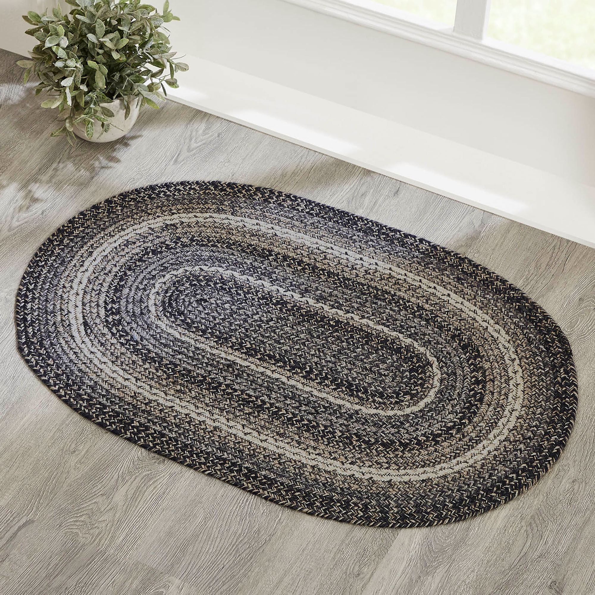 Sawyer Mill Black and Gray Braided Oval Rug with Included Rug Pad