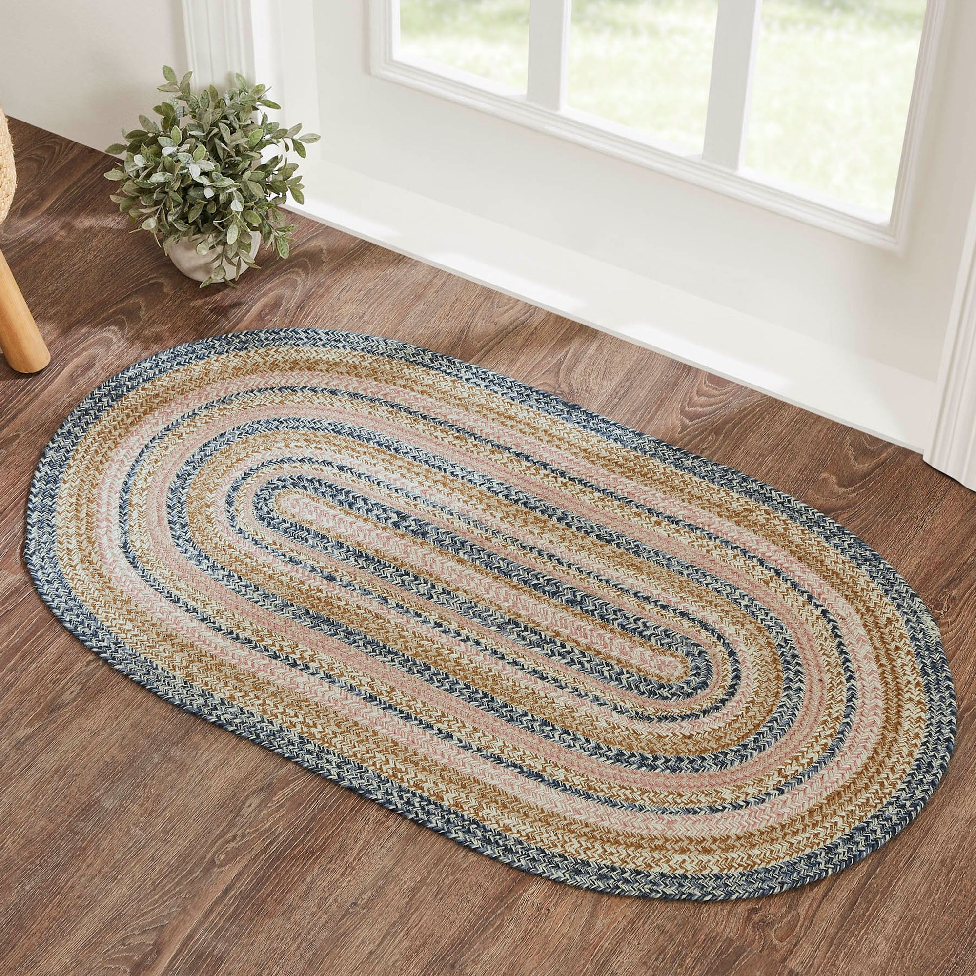 Kaila Braided Oval Rug with Included Rug Pad