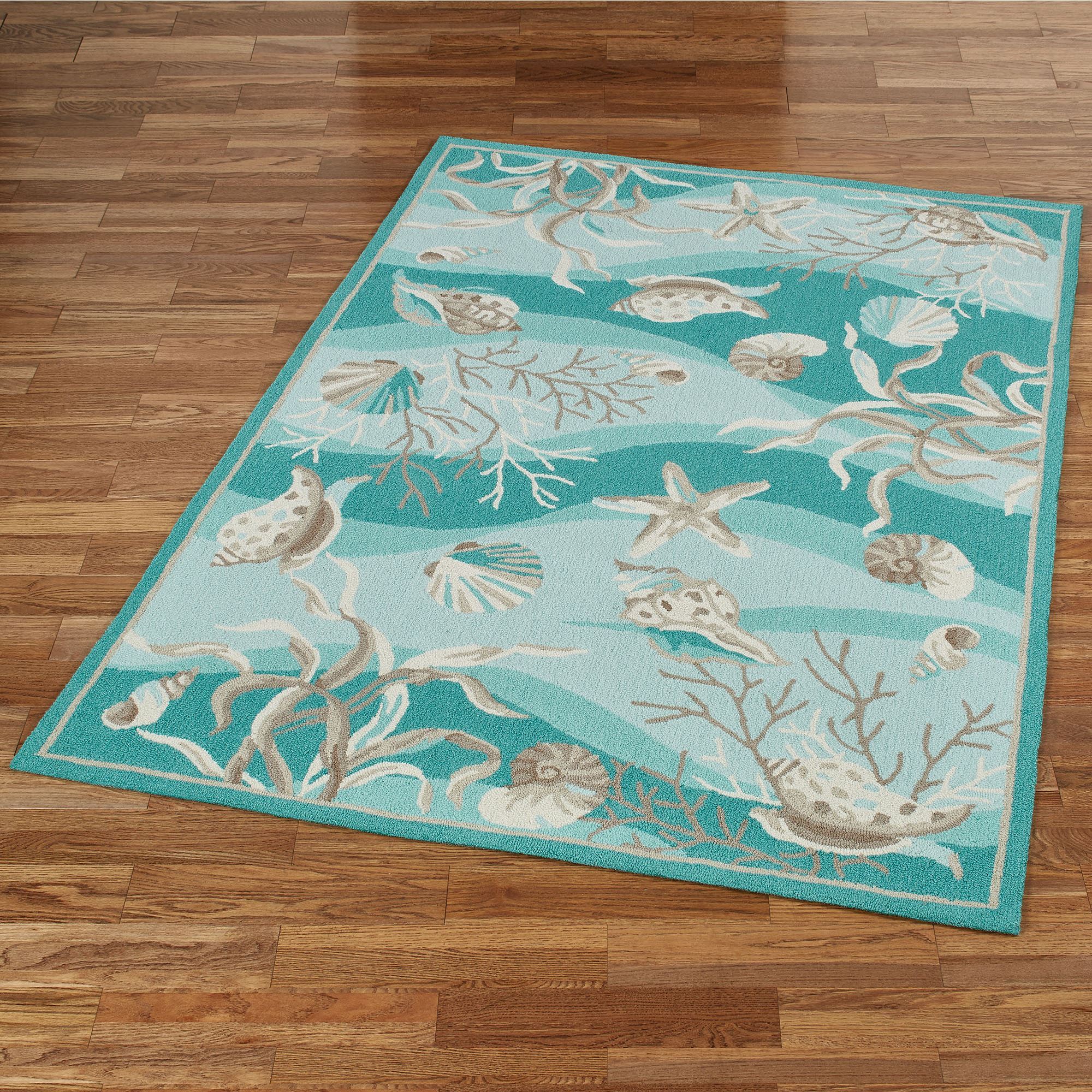 Hidden Treasures Teal Ocean Seashell Area Rugs