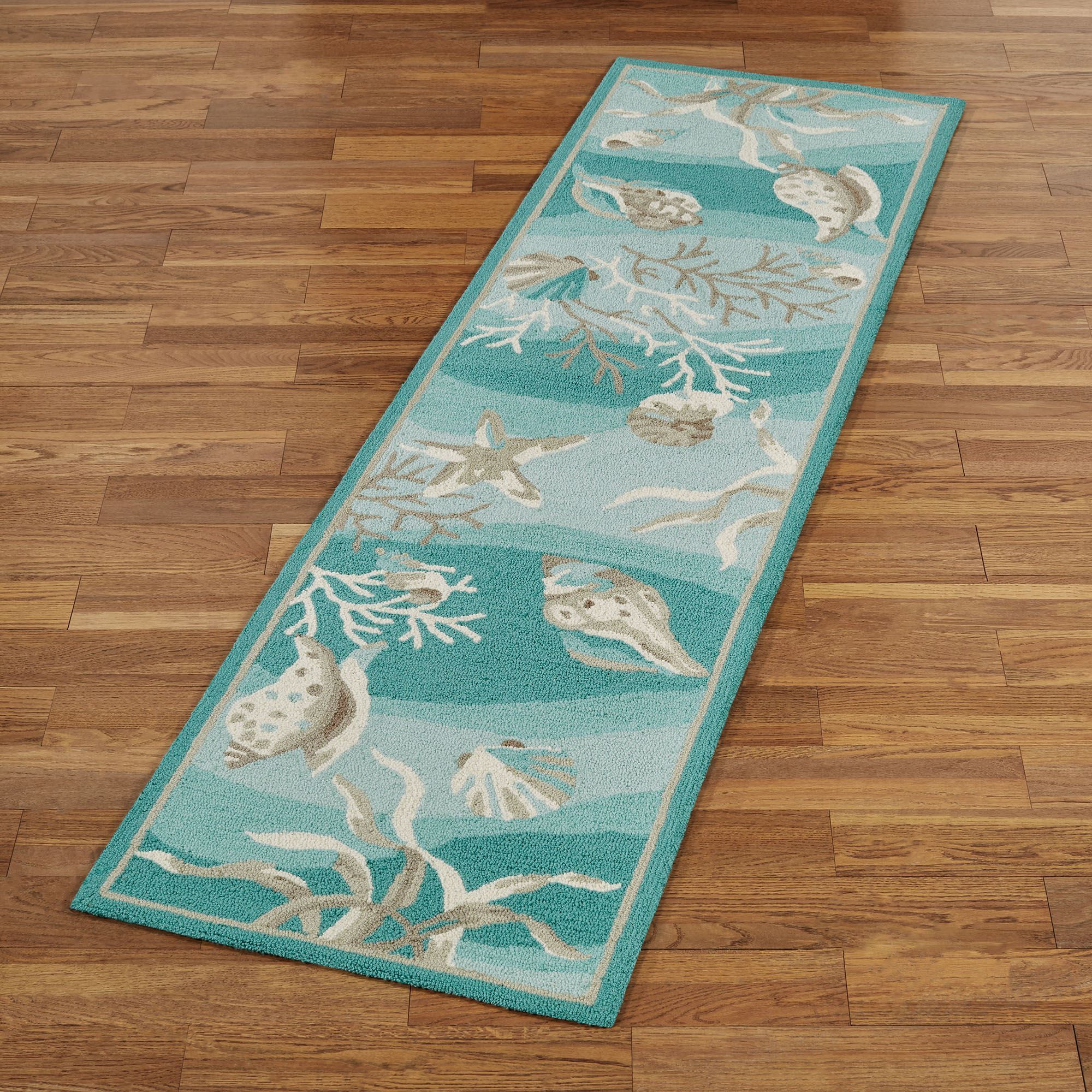 Hidden Treasures Teal Ocean Seashell Area Rugs