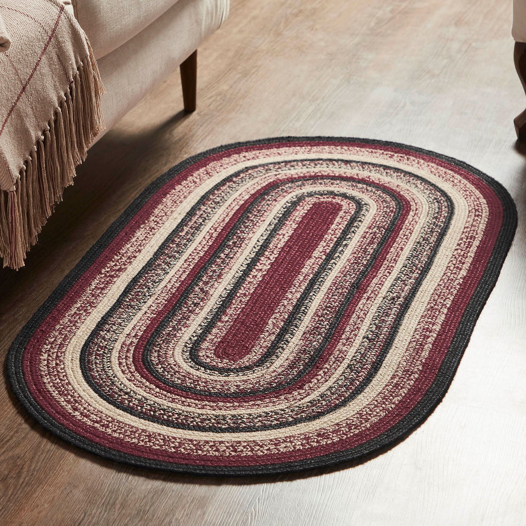 Connell Dark Red Braided Oval Rug with Included Rug Pad